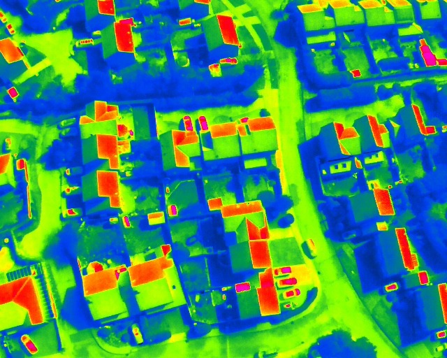 Thermal aerial map of a housing estate showing heat loss through roofs